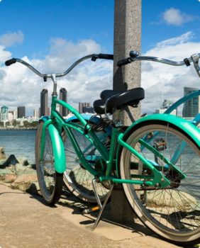 bike parked with city skyline in background