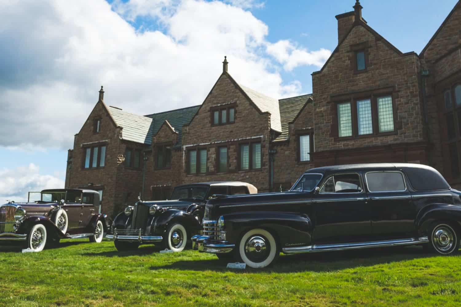 cars in front of a house