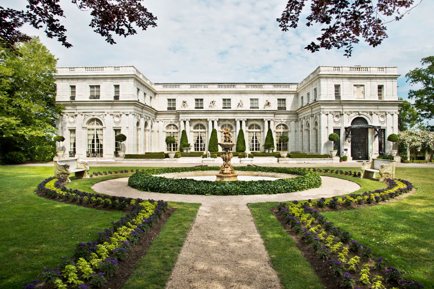 beautiful mansion with landscaped yard