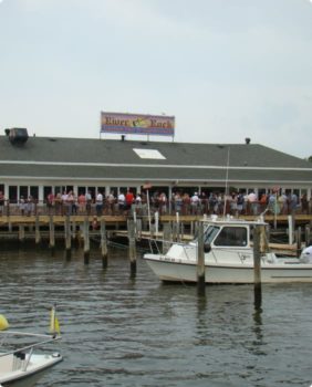 river rock building on water