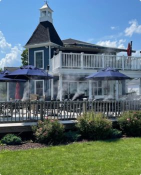 outdoor dining with misters and umbrellas
