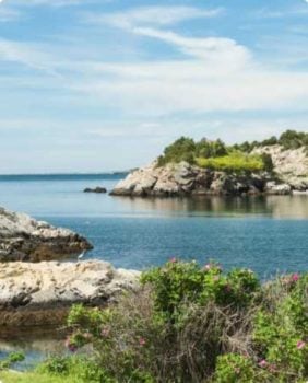 small rocky island in a bay