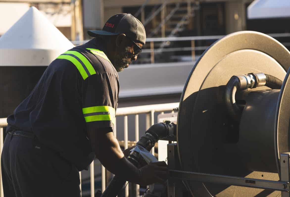 a man pumping fuel