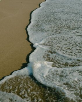 wave washing up on beach